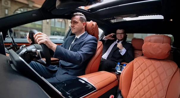 Luxury BMW chauffeur interior for London airport transfers