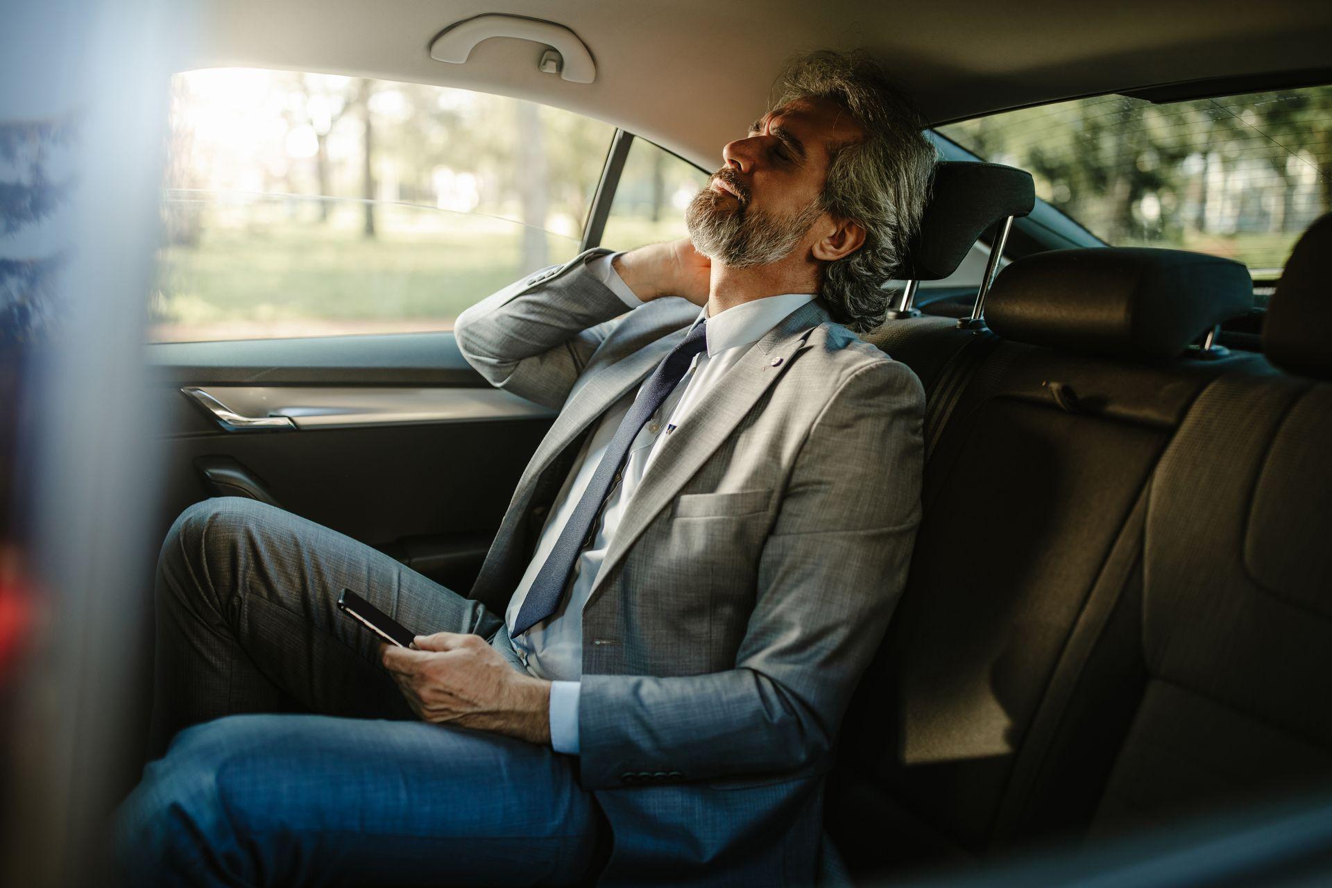 Executive airport transfer vehicle interior with luxury seating